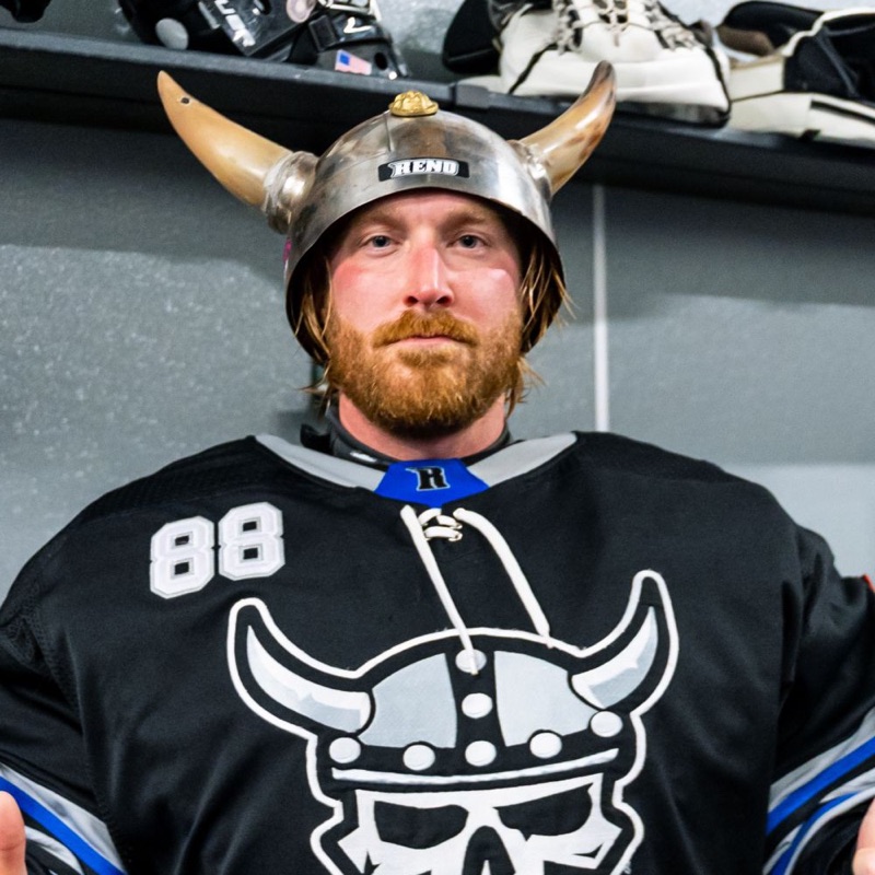 Justis Gyori, CEO of Bifrost Sports, in a horned Viking helmet and his number 88 jersey